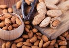 How many kilograms of almonds does a 5-year-old tree produce?
